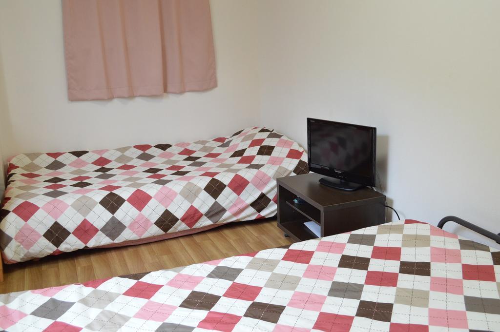 Guest House Fukutomi - Female Only Naha Phòng bức ảnh